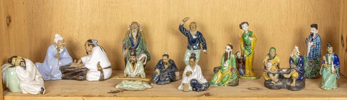 A shelf of Chinese ceramic scholar and various figures