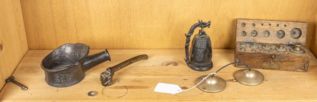 A shelf of Asian decorative articles (1 of 1)