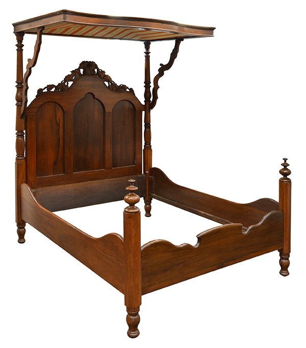 American Rococo Revival rosewood and mahogany hal: American Rococo Revival rosewood and mahogany half-tester bed, circa 1860, the serpentine superstructure surmounting the turned supports flanking the graduated headboard having a relief carved grape v