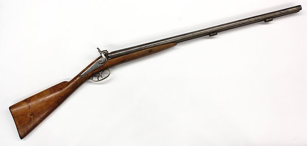 English percussion cap double barrel rifle: English percussion cap double barrel rifle, having a cherry stock with brass mounts, 45""l (lacking ramrod)