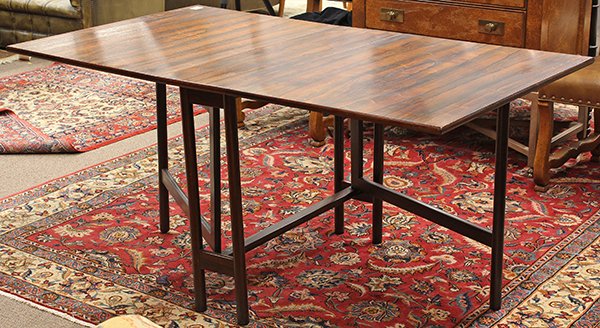 Bruno Mathsson style drop leaf table: Bruno Mathsson style drop leaf table, executed in highly figured rosewood, having two 25.5"" leaves and rising on turned legs, 29""h x 61""w (extended) x 34.5""d