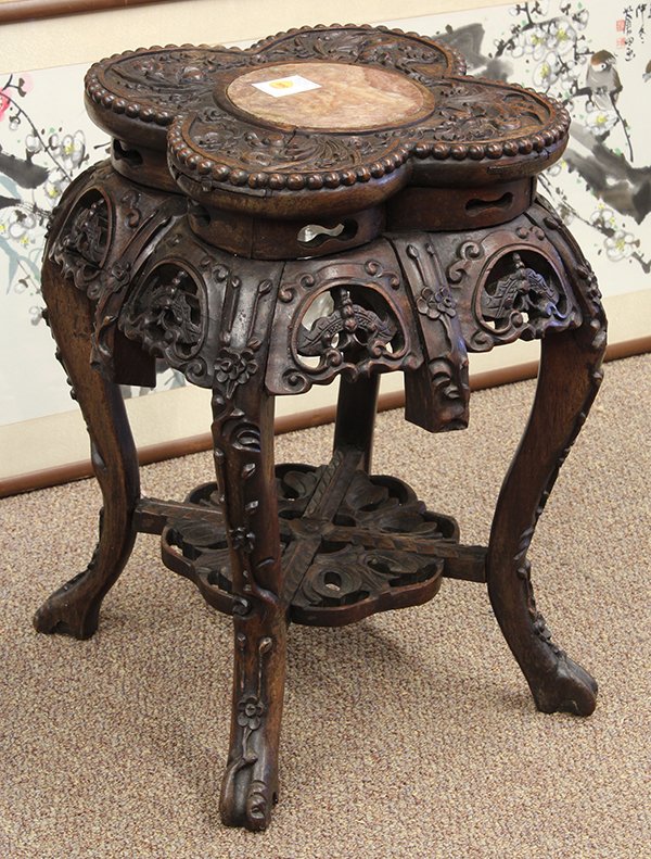 Chinese Export Marble and Wood Stand: Chinese marble inset wooden export stand, with a circular pink marble plaque within a lobed bead edge frame carved with bats and clouds, the apron pierced with butterflies in reserve and flanked by ca