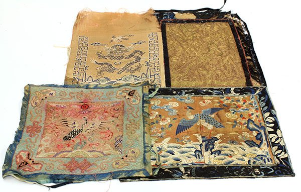 Four Chinese Textile Fragments: (lot of 4) Chinese textile fragments, consisting of an orange panel woven with a blue dragon and phoenix above rolling waves; one badge embroidered with a bird on a couched ground and framed within a 