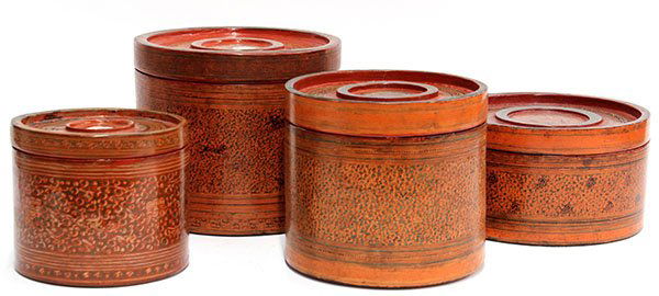 Burmese Lacquered Boxes: (lots of 4) Group of Burmese lacquered covered boxes, including two decorated with monkeys and zoomorphs on a dense red and green scrolling ground, largest 8.5" diameter