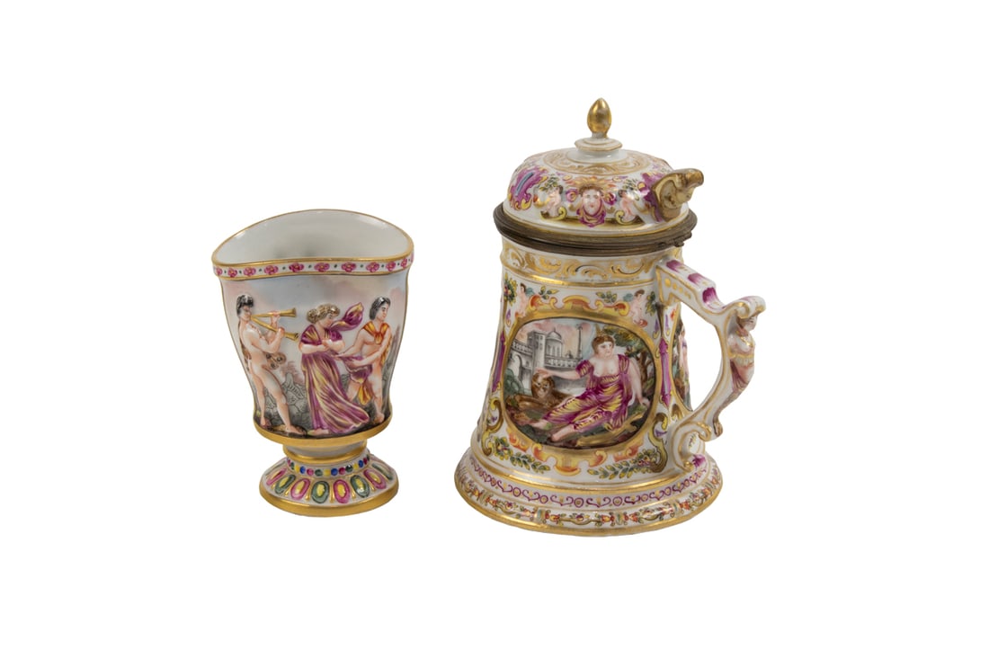 Two Capodimonte style porcelain table articles: Two Capodimonte style porcelain table articles, first half 20th century, each decorated in relief with classical figures, underglazed blue crowned 'N' mark, comprising gilt bronze mounted covered tank