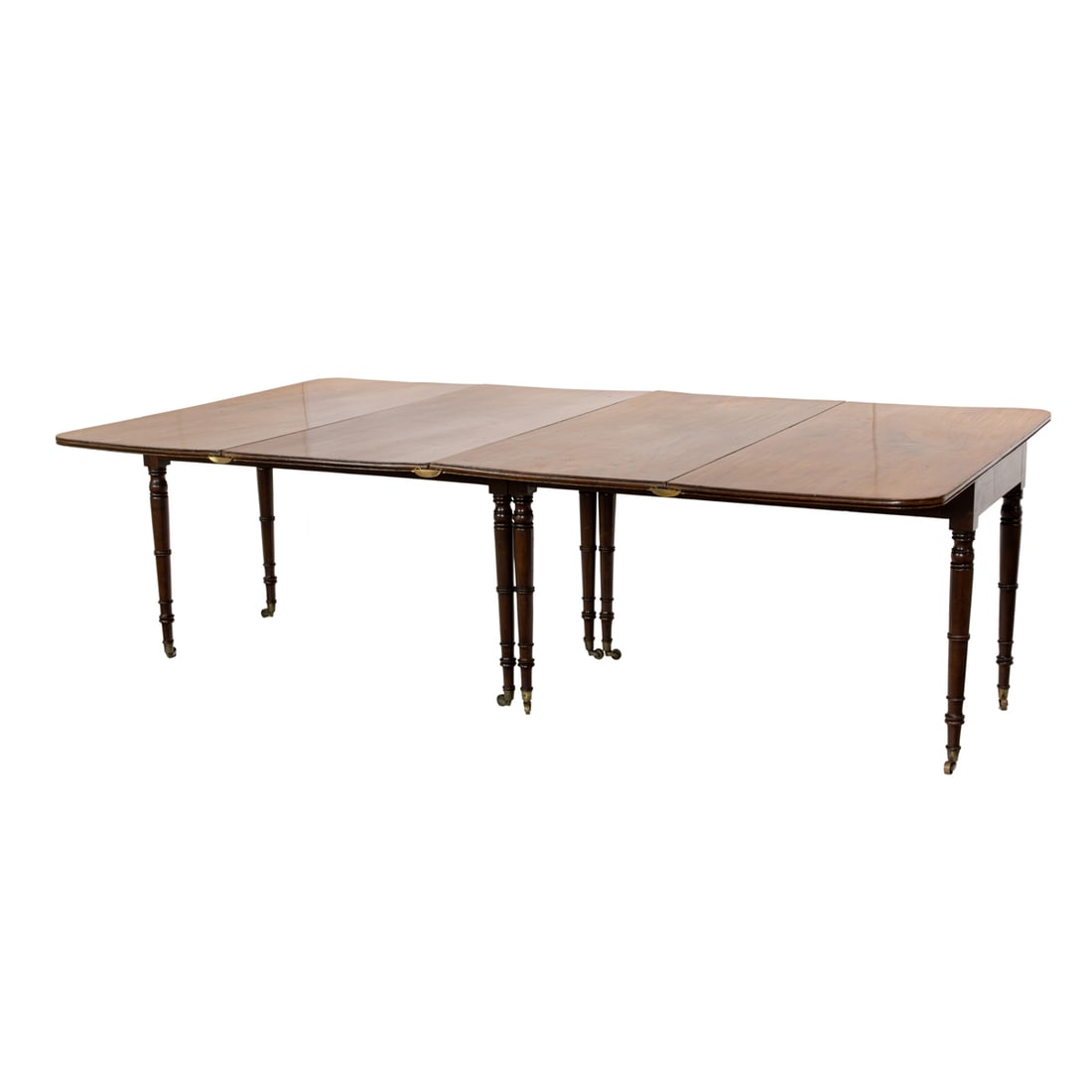 A Regency style dining table, 19th century: A Regency style dining table 19th century, in two parts with highly figured single board tops, and rising on turned legs, 28.5"h x 93.5"w (extended) x 54"d. Provenance: The San Francisco headquarters