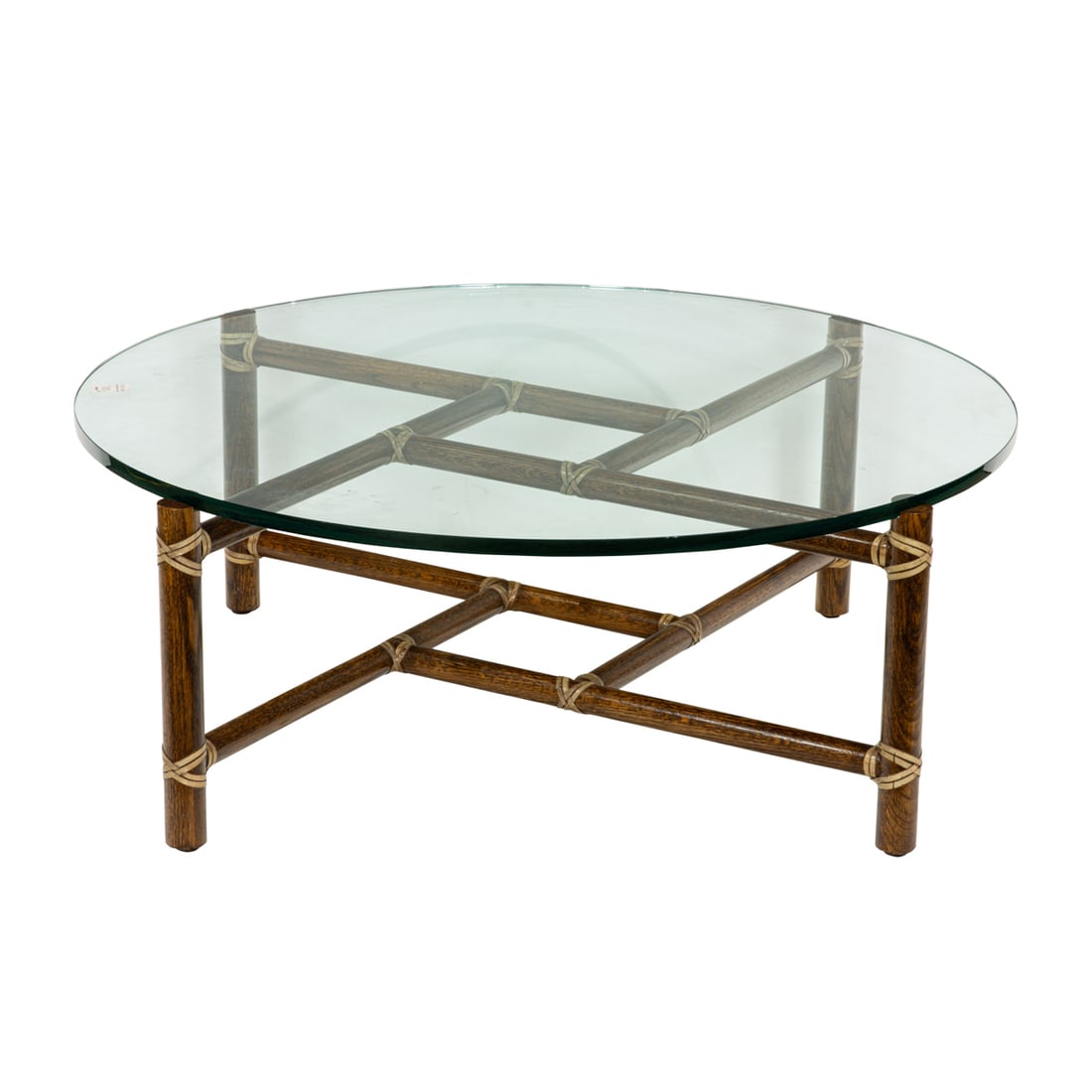 A McGuire rattan wrapped coffee table with a round glass top (1 of 4)