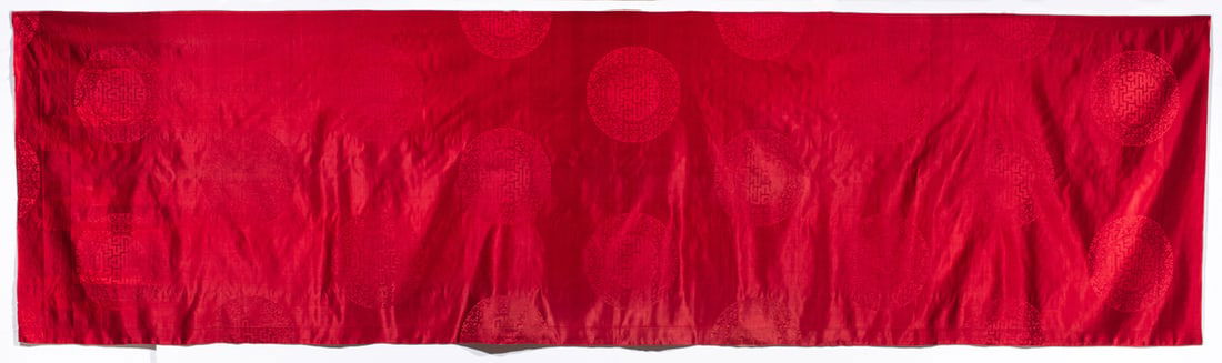 A Chinese red ground satin fabric: A Chinese red ground satin fabric. Featuring roundel patterns, Republic period, 106"h x 29.75"w.