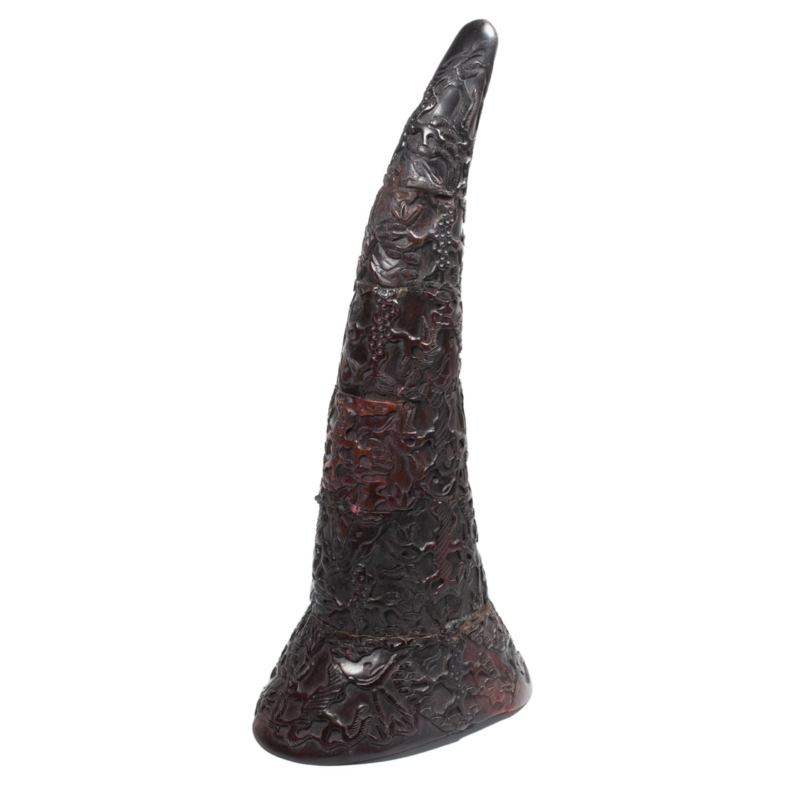 A Chinese water buffalo horn carving: A Chinese water buffalo horn carving. Decorated with pine tree and figural designs, 12.5" high.