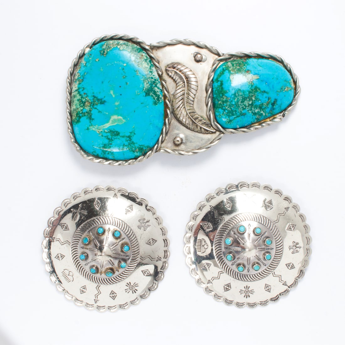 A Navajo old pawn shop turquoise stone belt buckle with a leaf frond (1 of 1)