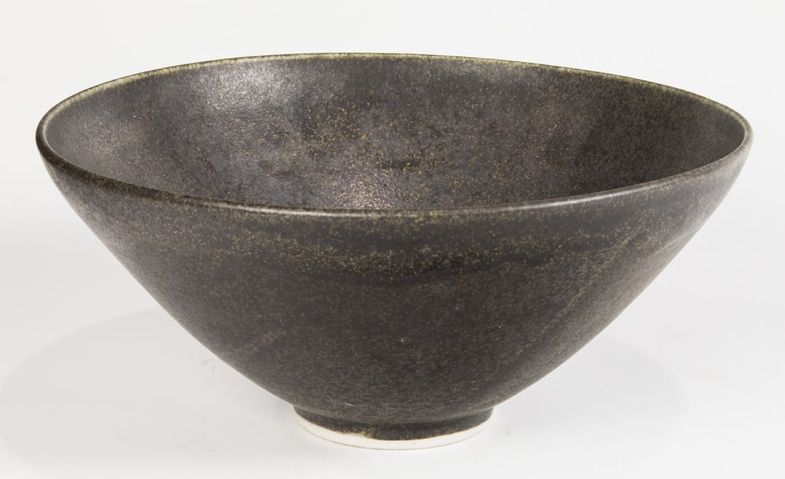 A Studio ceramic bowl with volcanic glaze in the style of James Lovera: A Studio ceramic bowl with volcanic glaze in the style of James Lovera, indistinctly signed, 5.25"h x 11.75"dia