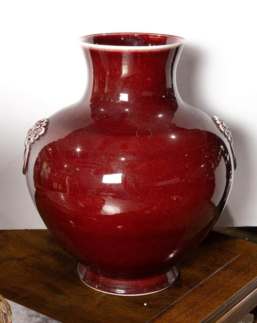 A modern Chinese oxblood glaze vase with faux lion handles (1 of 1)