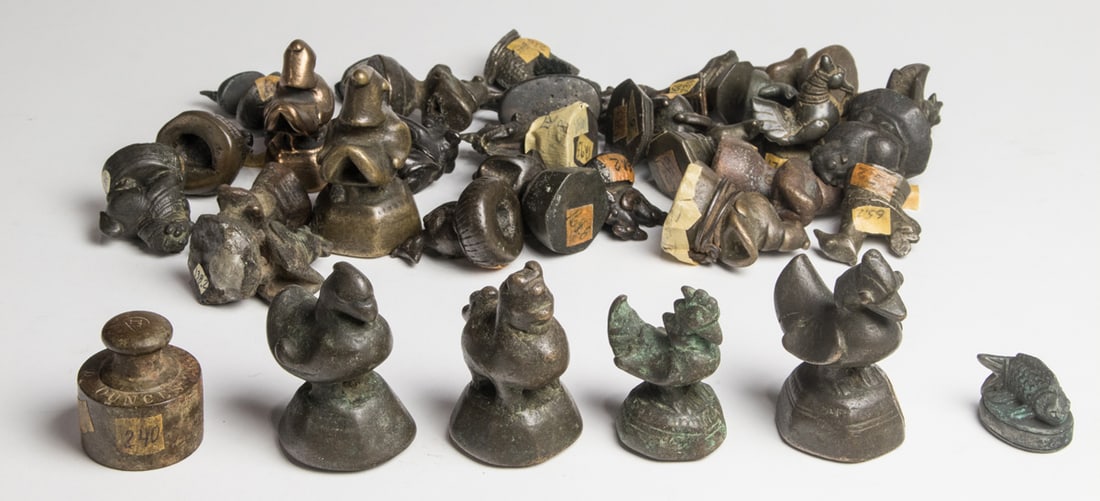 A selection of Burmese bronze weights: A selection of Burmese bronze weights. Late 19th/early 20th century, 2.75" tallest.