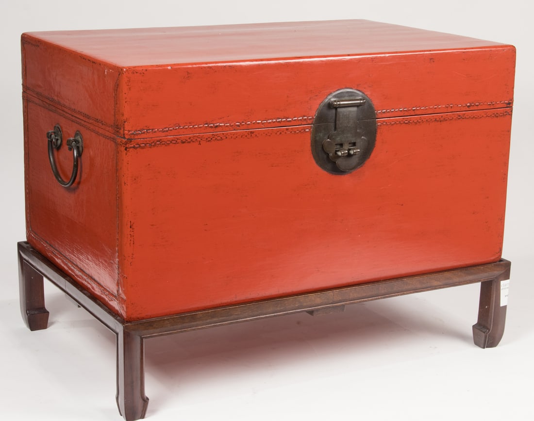 A Chinese red leather chest and wood stand (1 of 1)