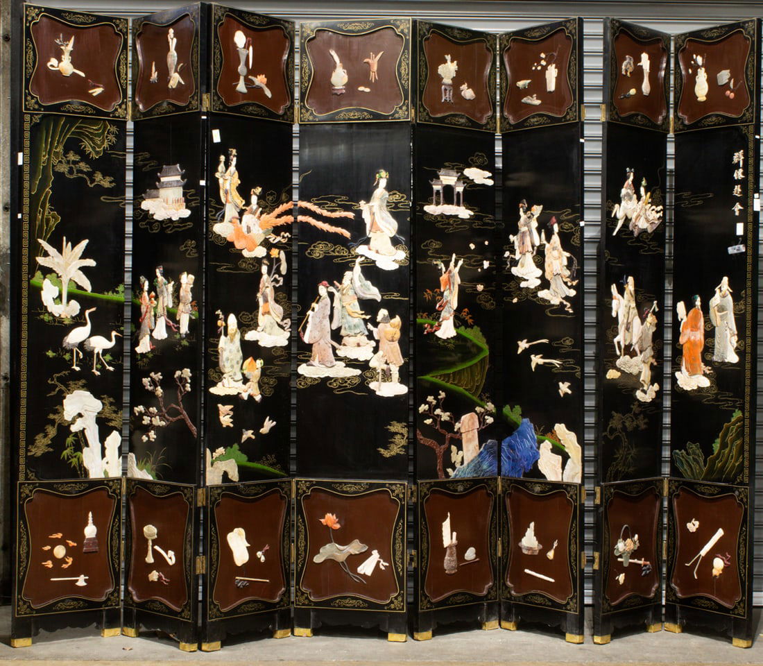 A Chinese eight-panel stone and bone inlaid folding screen: A Chinese eight-panel stone and bone inlaid folding screen. 20th century, 96"h x 144"w overall.