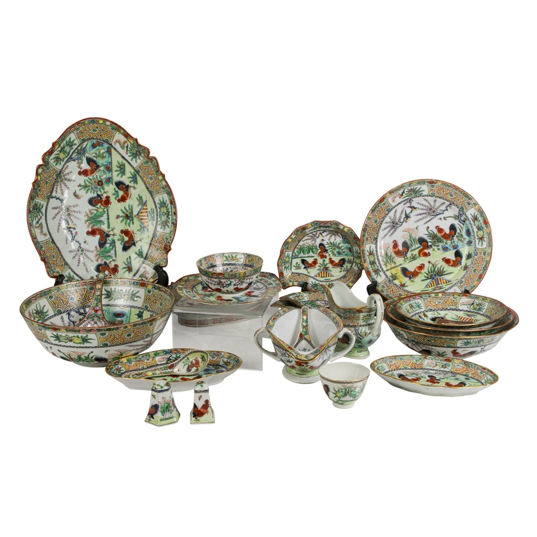 A set of Chinese export famille rose canton 'rooster' dinner service: A set of Chinese export famille rose canton 'rooster' dinner service. Comprising of various plates, bowls, punch bowls, spoons, Republic period, from 3" to 15.75" across.