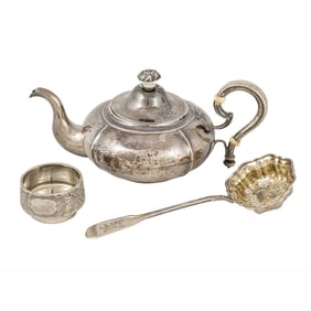 A Russian .875 silver teapot and a salt bowl