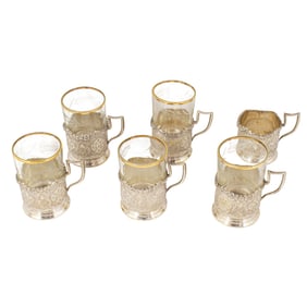 Six Persian .875 silver tea glass holders with five gilt rimmed etched glasses
