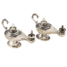 A pair of European silver oil lamps
