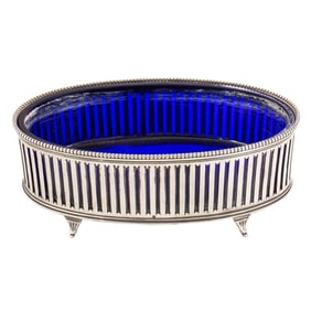 A Dutch .934 silver center bowl with a cobalt blue liner
