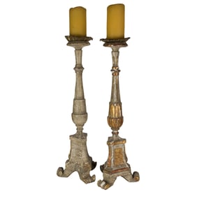 A pair of Continental Baroque style candle prickets
