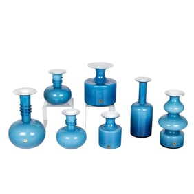 A suite of seven Kastrup Holmegaard turquoise cased glass vases