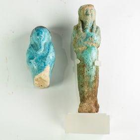 Two Egyptian turquoise glazed figures of ushabti