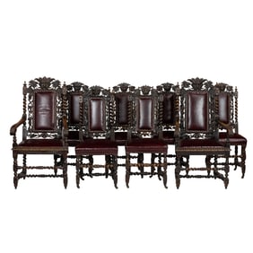 A suite of eight Renaissance style dining chairs