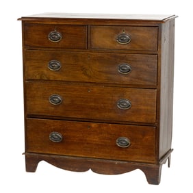 A George III walnut chest of drawers circa 1790