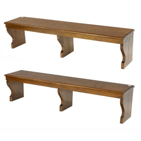 A pair of Arts and Crafts oak benches, commissioned for Santa Sabina Center