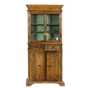 An Italian Renaissance style walnut china cabinet