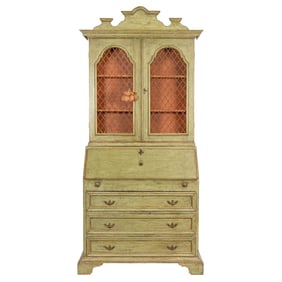 A Florentine style parcel gilt and pale green secretary bookcase