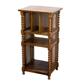 An Arts & Crafts oak and wicker magazine holder