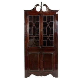 A Chippendale style corner display cabinet