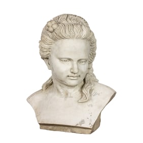 A Classical style marble bust of a young woman