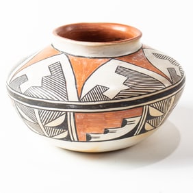 An Acoma pot, the compressed ovoid form painted with geometric decoration, signed Manuelle Kohe, 6"h
