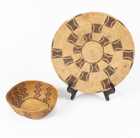 A group of two monochrome Native American baskets