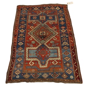 An antique Caucasian Kazak runner