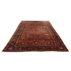 An antique Persian Kashan carpet