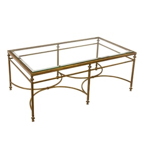 A contemporary burnished gilt cocktail table