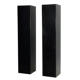 A pair of contemporary black lacquer tall cabinets
