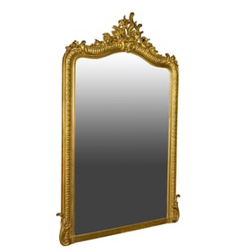 A Louis XV style parcel gilt mirror