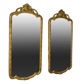 A pair of Rococo style giltwood carved wall mirrors second half 19th century