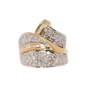 A diamond and 14k gold ring