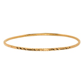 A high karat gold bangle bracelet