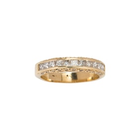 A diamond and 14k gold ring