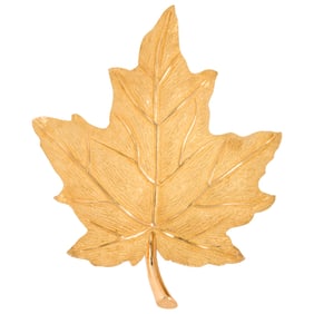 A Tiffany & Co. 18k gold maple leaf