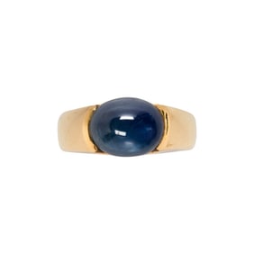 A sapphire and 18k gold ring
