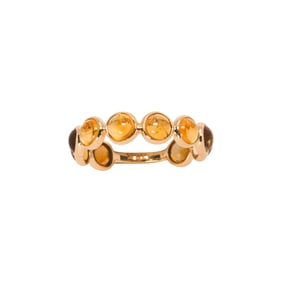 A citrine and 18k gold band
