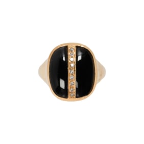 An onyx, diamond and 12k gold ring